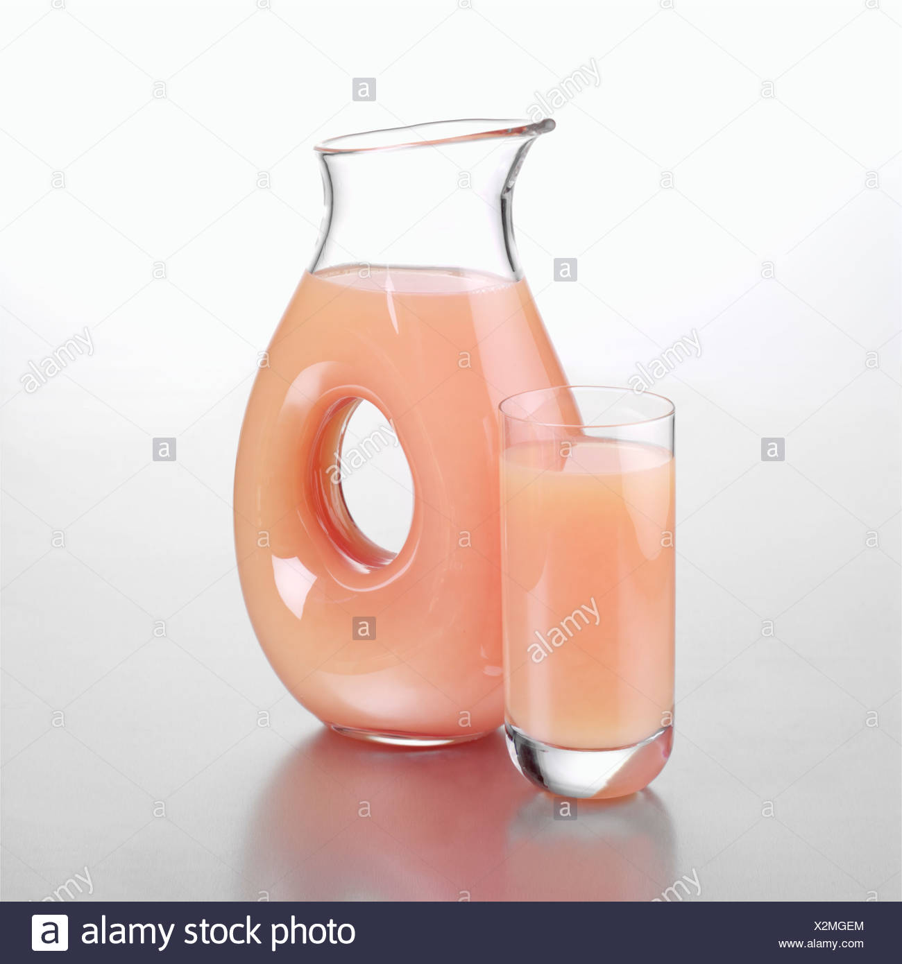 Download Jug Of Grapefruit Juice With A Full Glass Stock Photo 277047196 Alamy PSD Mockup Templates