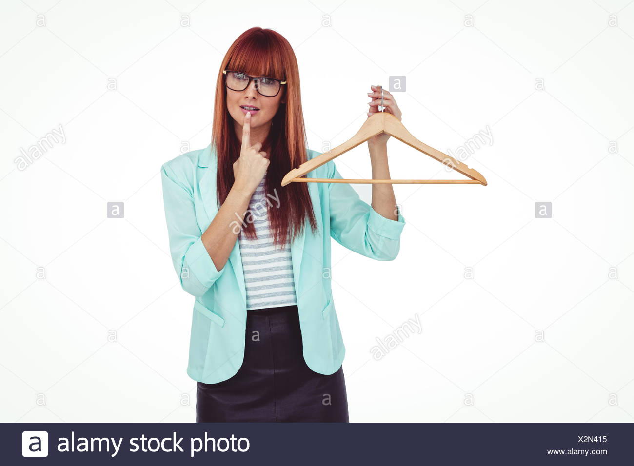 Hipster woman holding clothes hanger Stock Photo
