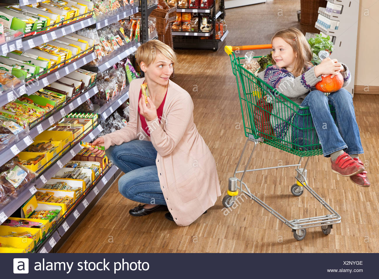 kid in shopping cart