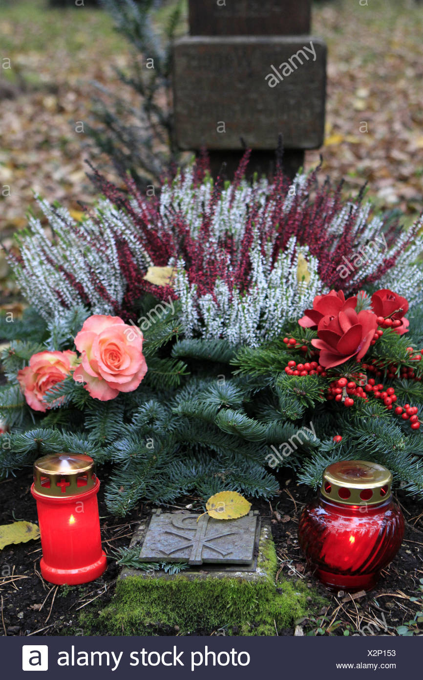 Geschmuecktes Grab auf einem Friedhof an Allerheiligen Stock Photo
