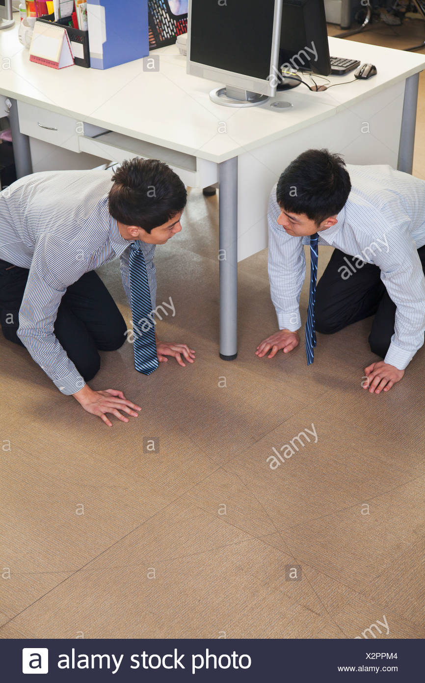 Kneeling On The Floor High Resolution Stock Photography and Images - Alamy