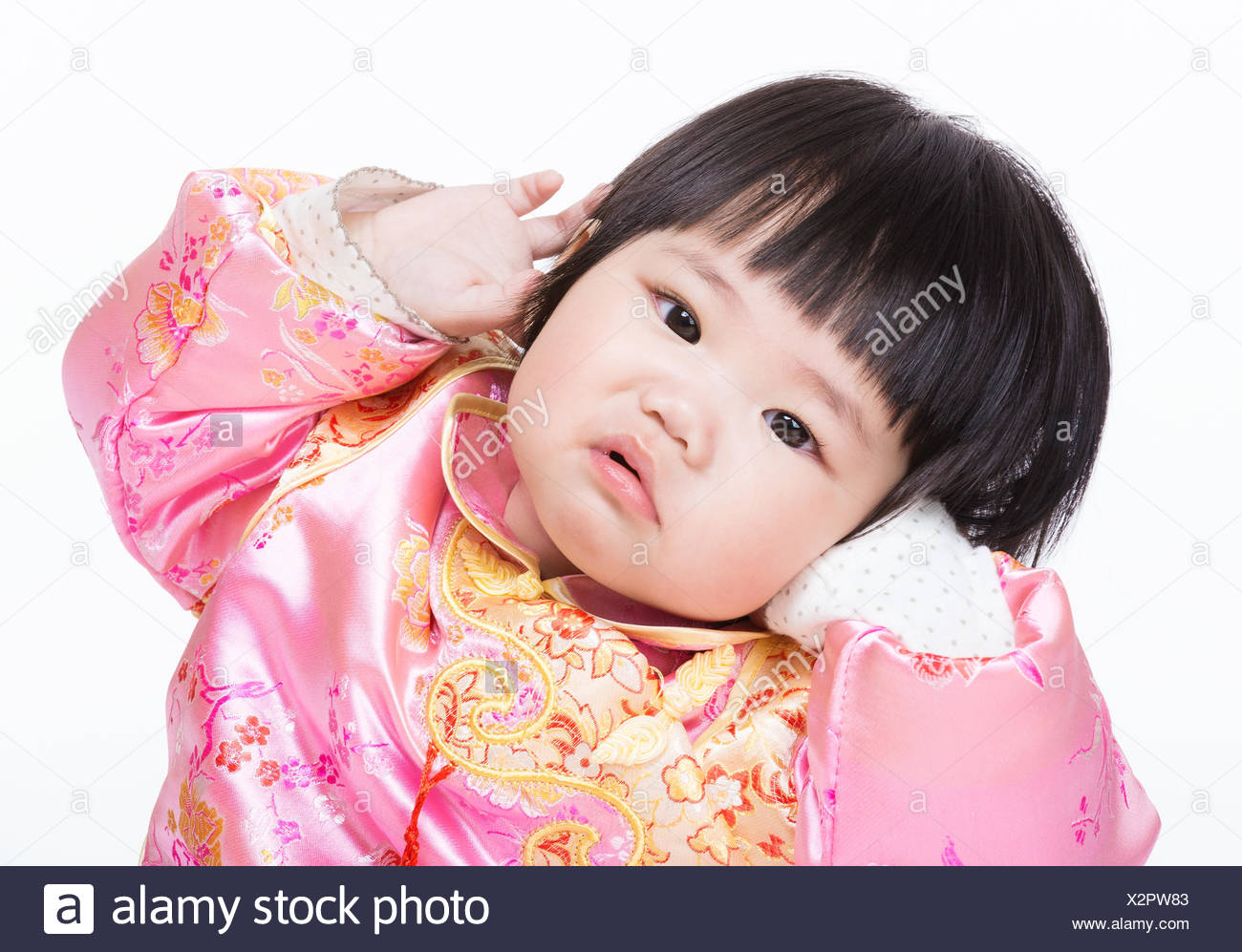 Baby Girl With Traditional Chinese Clothing And Having Funny