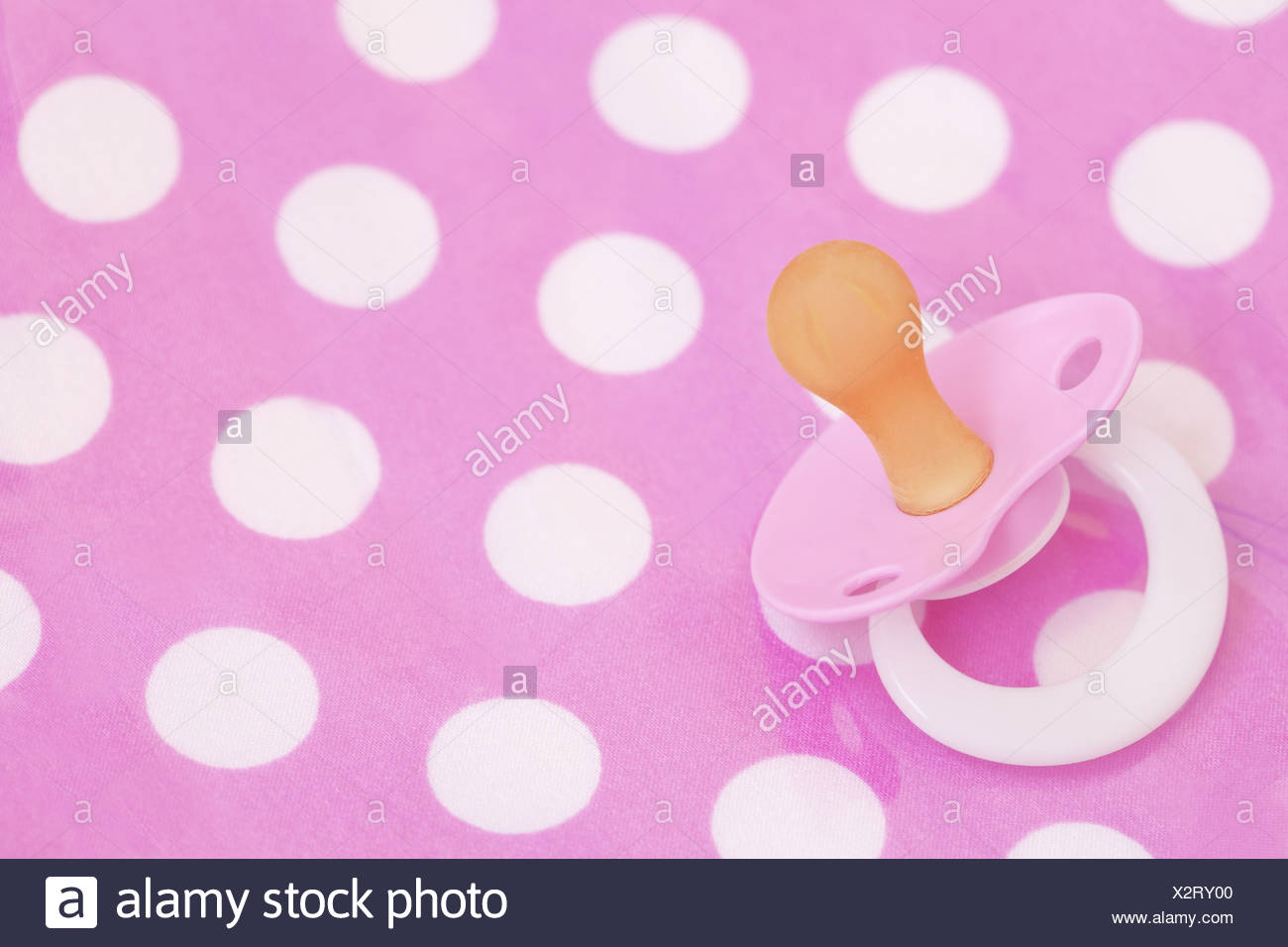 Pink Baby Dummy On Polka Dot Background Stock Photo 277121264 Alamy