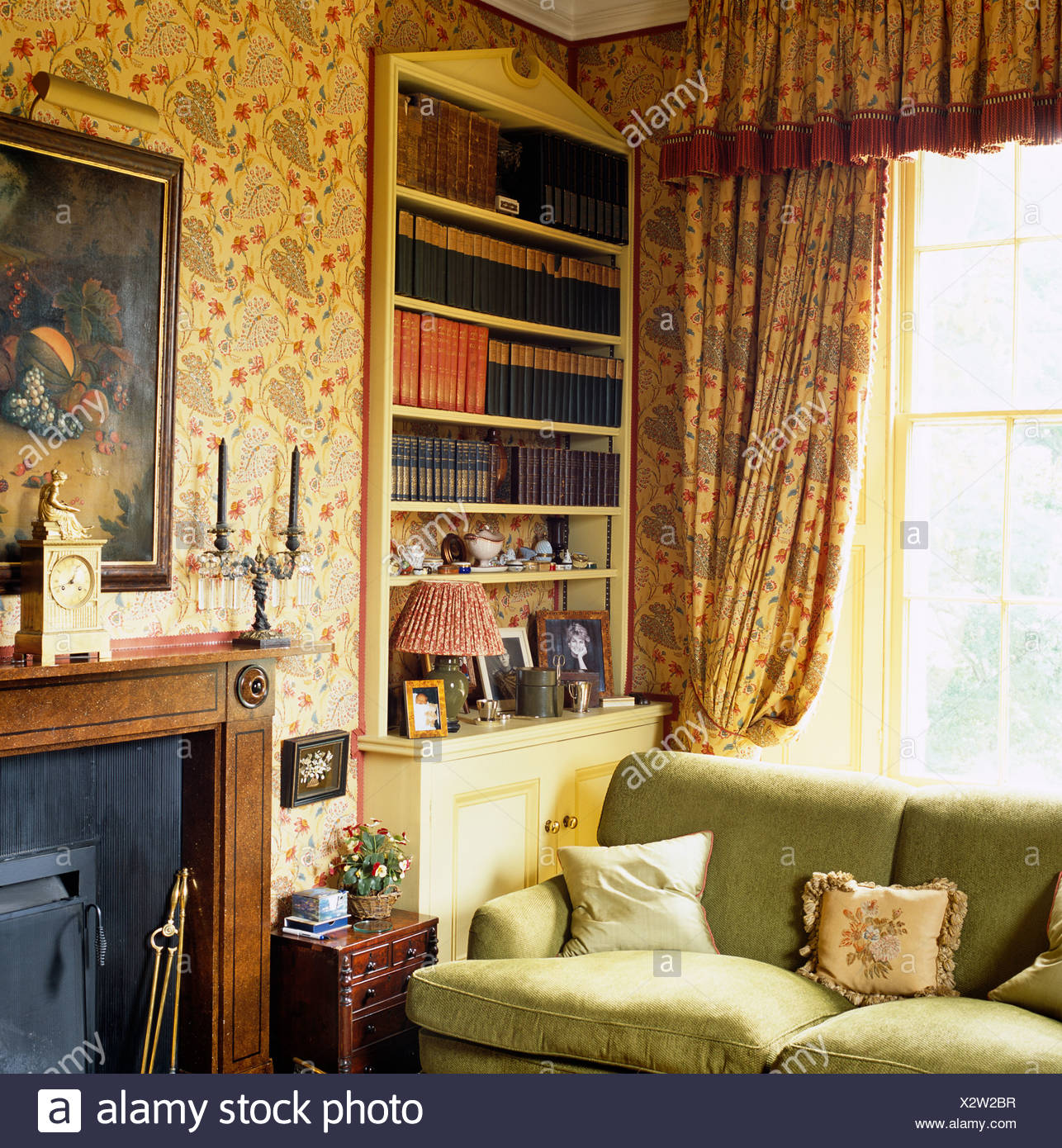 Floral Curtains And Pedimented Alcove Bookcase Behind Sofa Next To