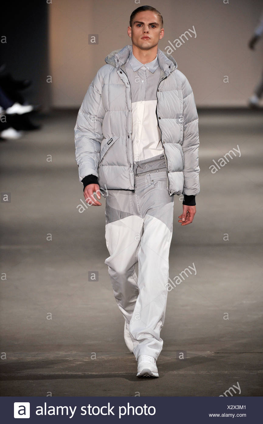 Christopher Shannon London Fashion week Ready to Wear Spring Summer Male  model wearing grey puffer jacket, grey and white Stock Photo - Alamy