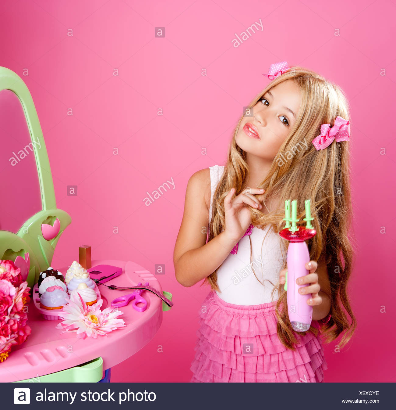 Hairdresser Blond Fashion Doll Girl With Hair Curler Stock Photo