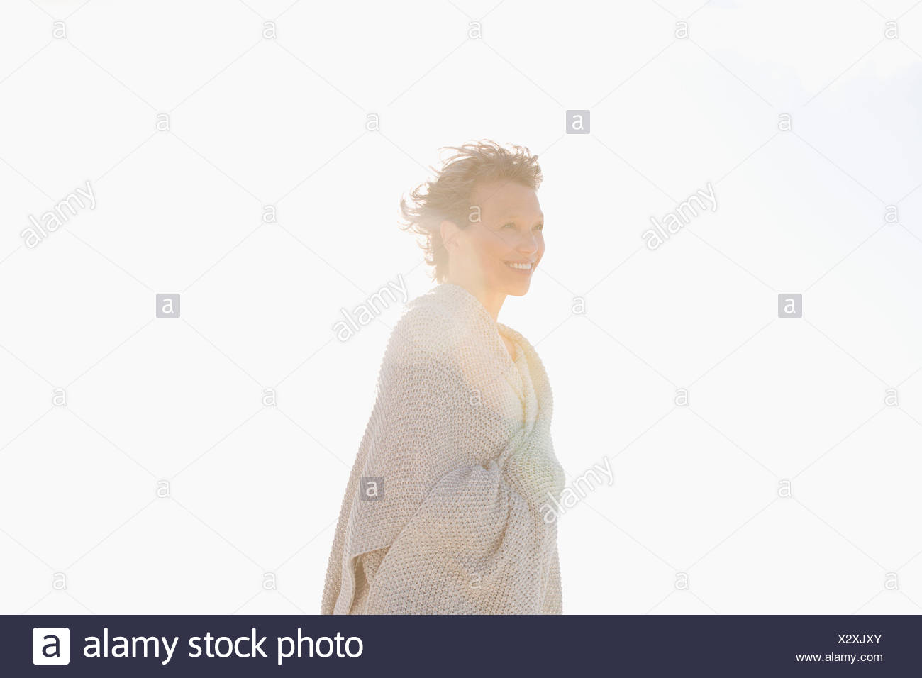 Side profile of a woman smiling Stock Photo
