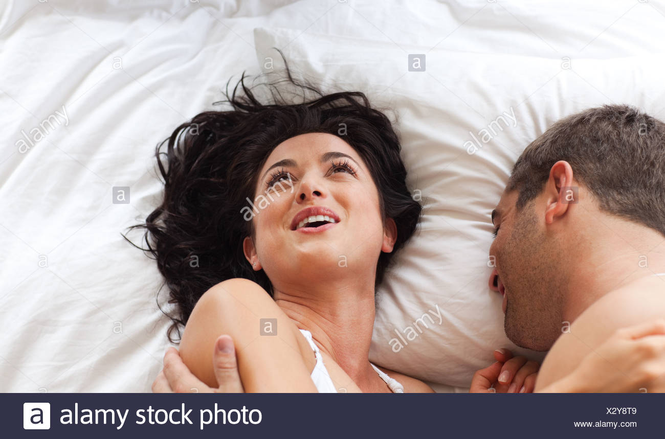 Lovely Couple On A Bed Stock Image Lovely Couple On A Bed Stock Image