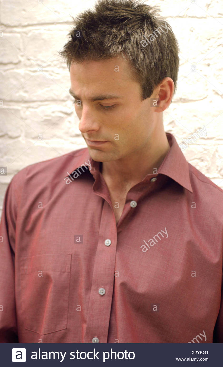 Profile Of Male With Short Brown Hair Wearing Dark Red Shirt