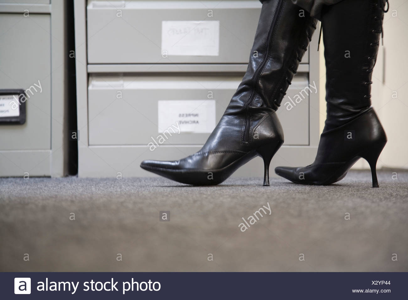 women wearing high heel boots