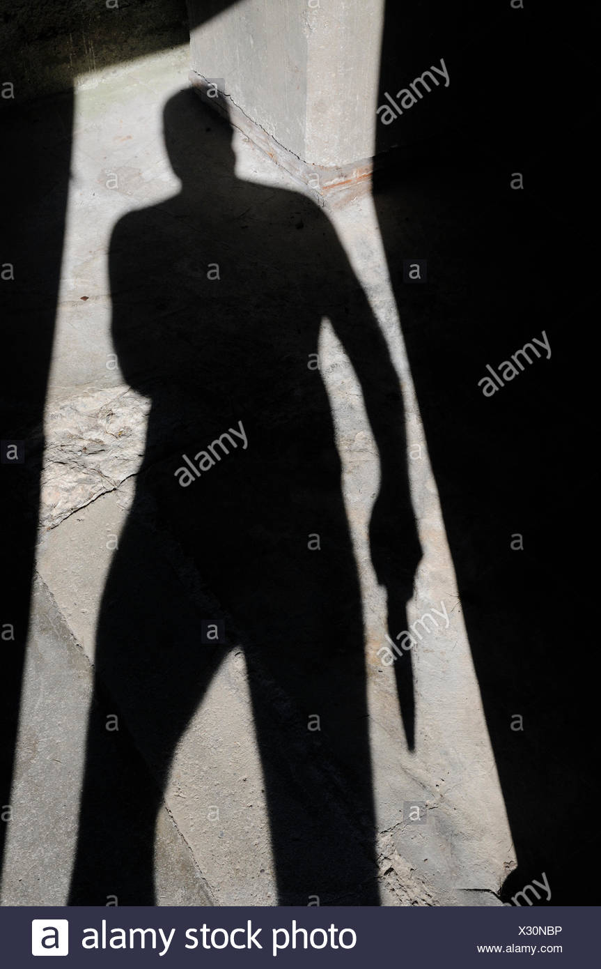 Man And Knife And Shadow Stock Photos & Man And Knife And Shadow Stock