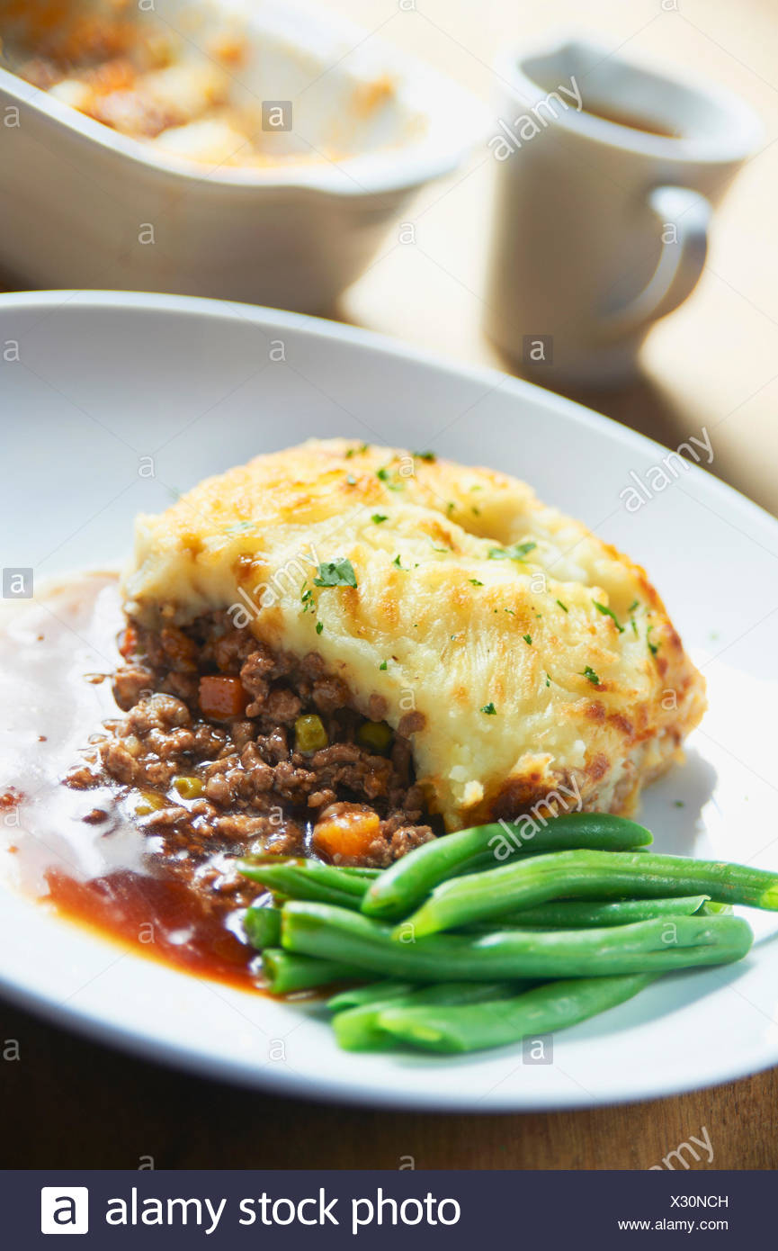 Plate Of Shepherds Pie With Green Beans Stock Photo 277226673 Alamy