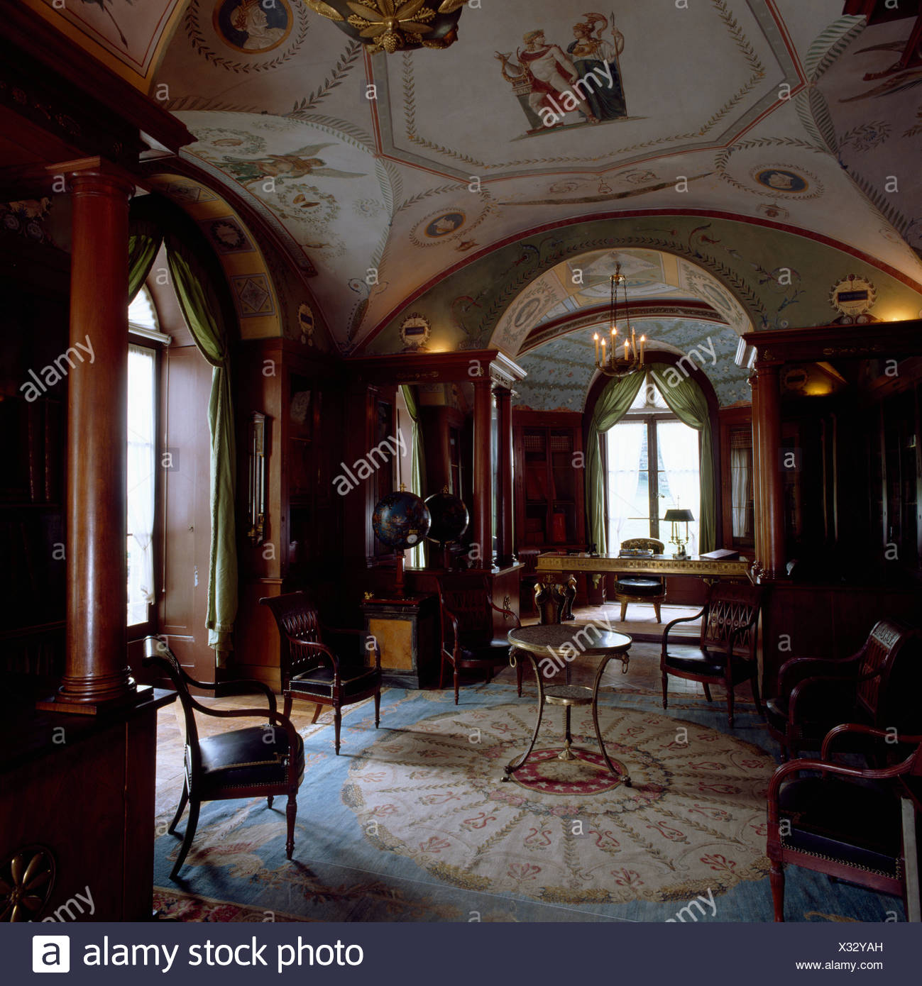 Painted Vaulted Ceiling And Antique Patterned Silk Carpet In