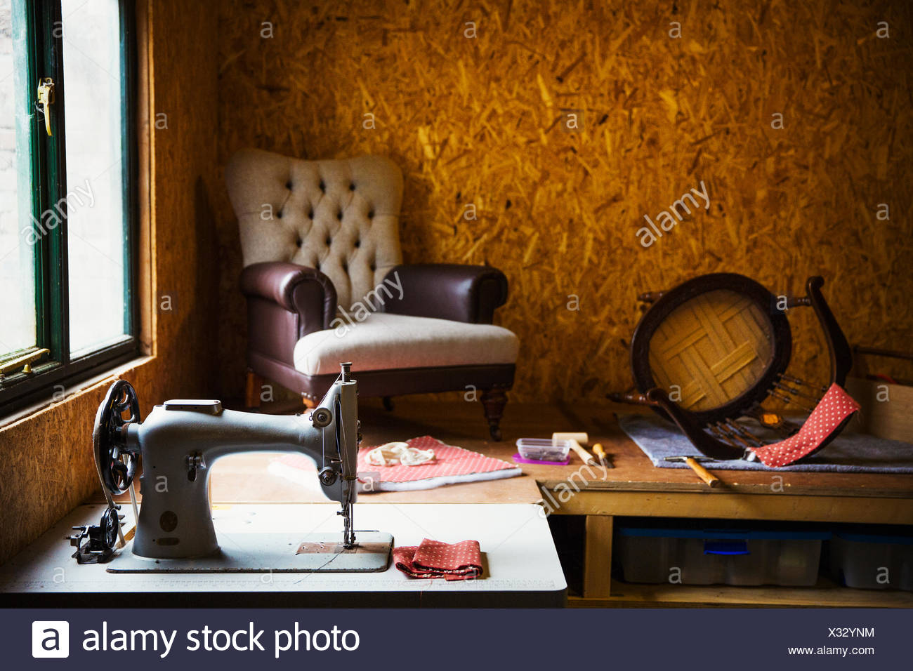 A Corner Of An Upholstery Workshop A Button Backed Chair And