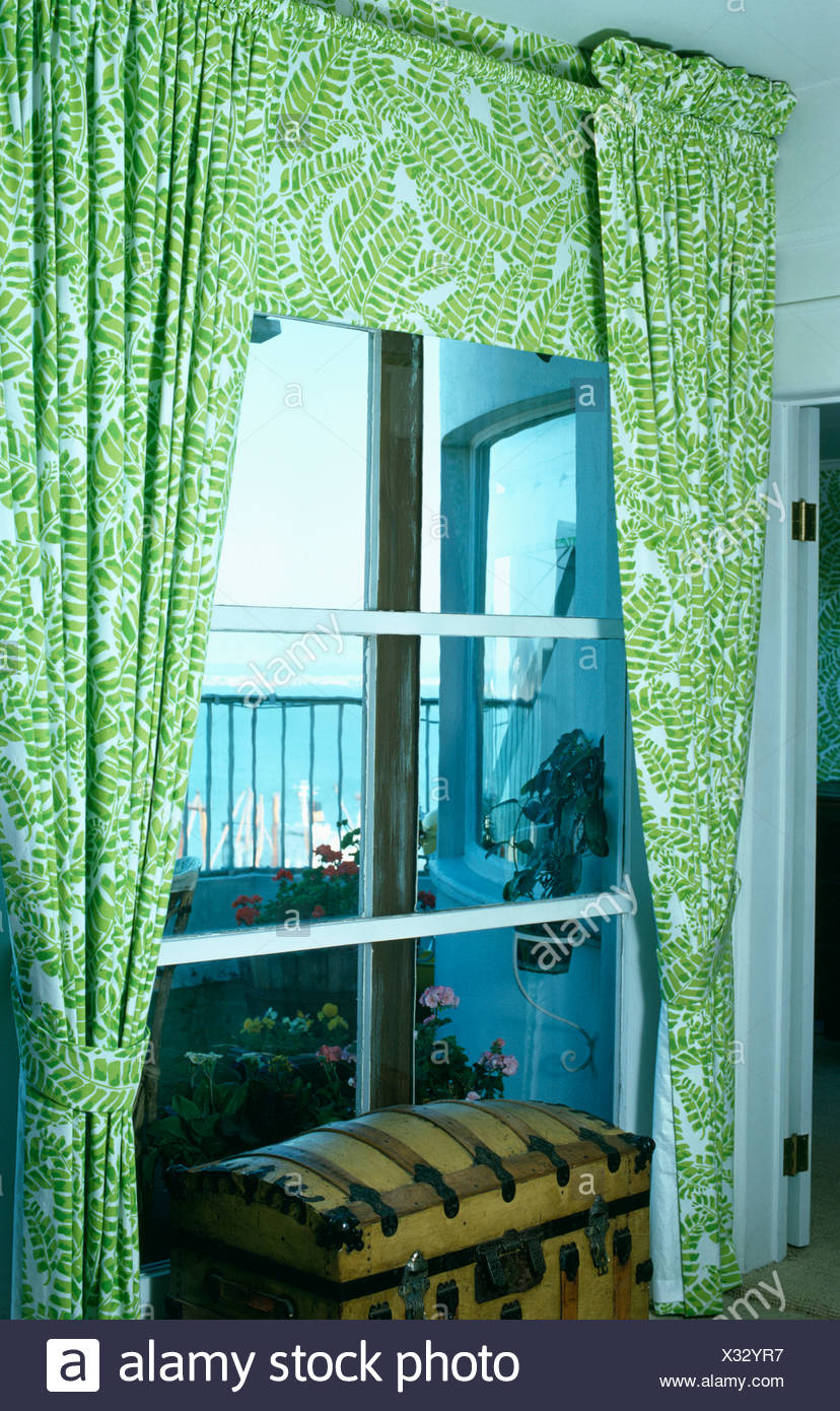 Close Up Of Green White Floral Patterned Curtains With Matching