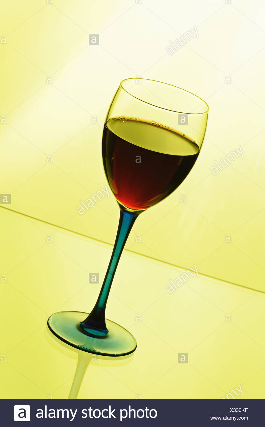 Download Wineglass With Red Wine On Yellow Background Stock Photo 277276259 Alamy Yellowimages Mockups