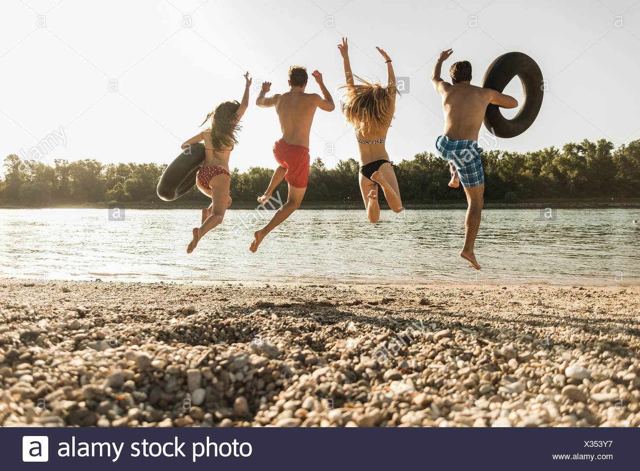 Man Floating In An Inner Tube High Resolution Stock Photography and