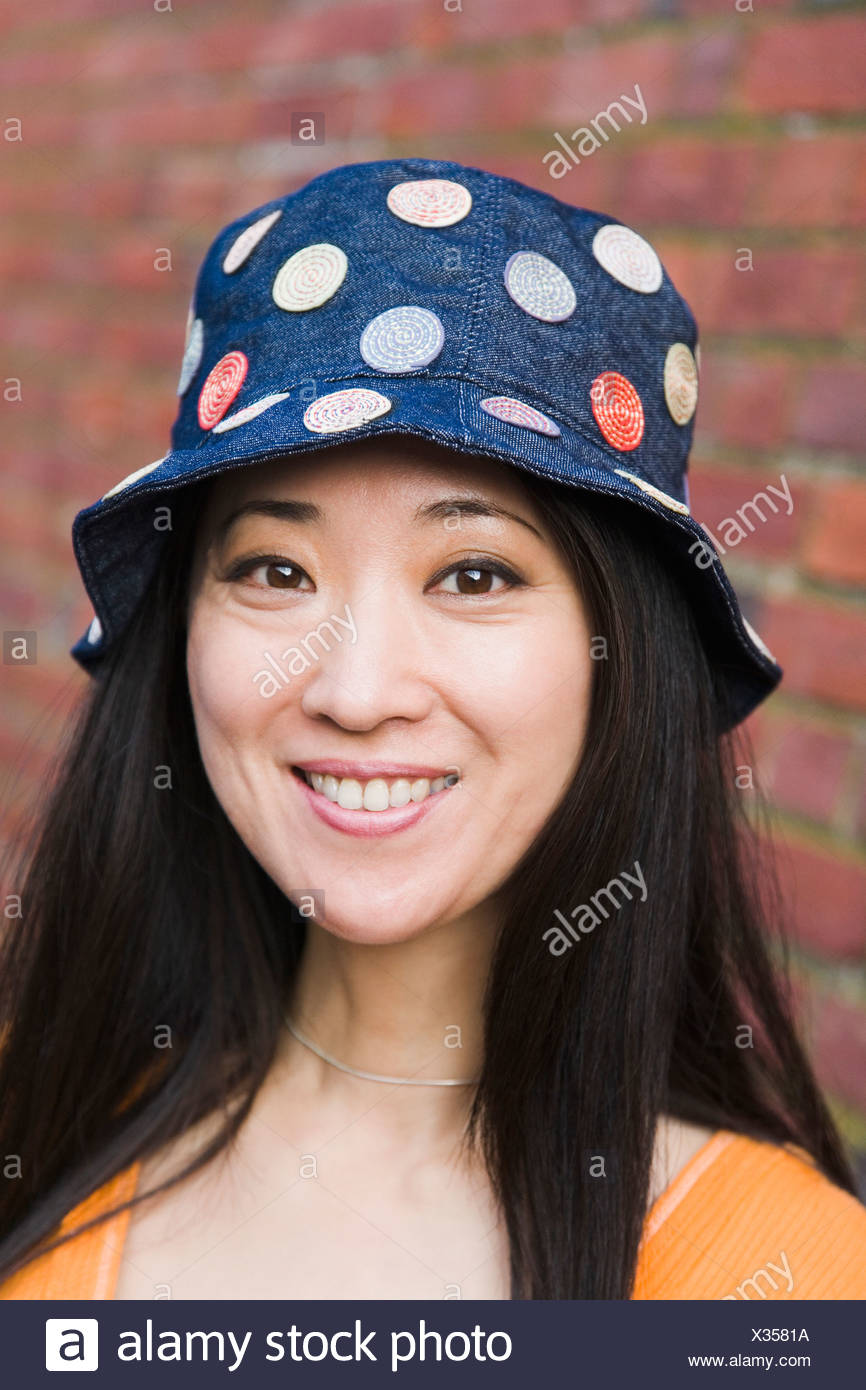 girl wearing bucket hat