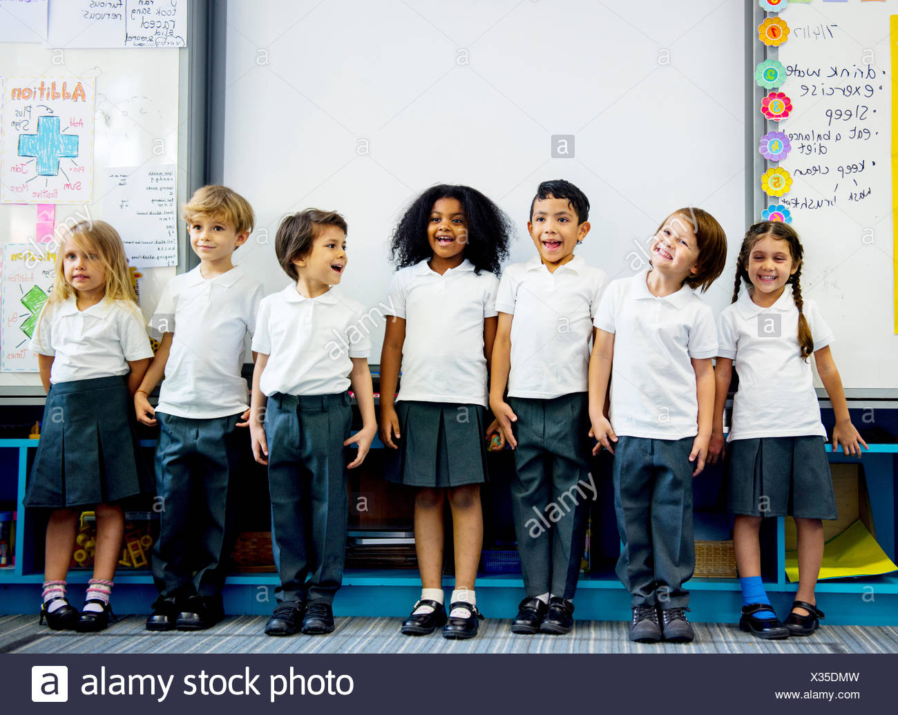 Group Kids Standing In Line High Resolution Stock Photography and