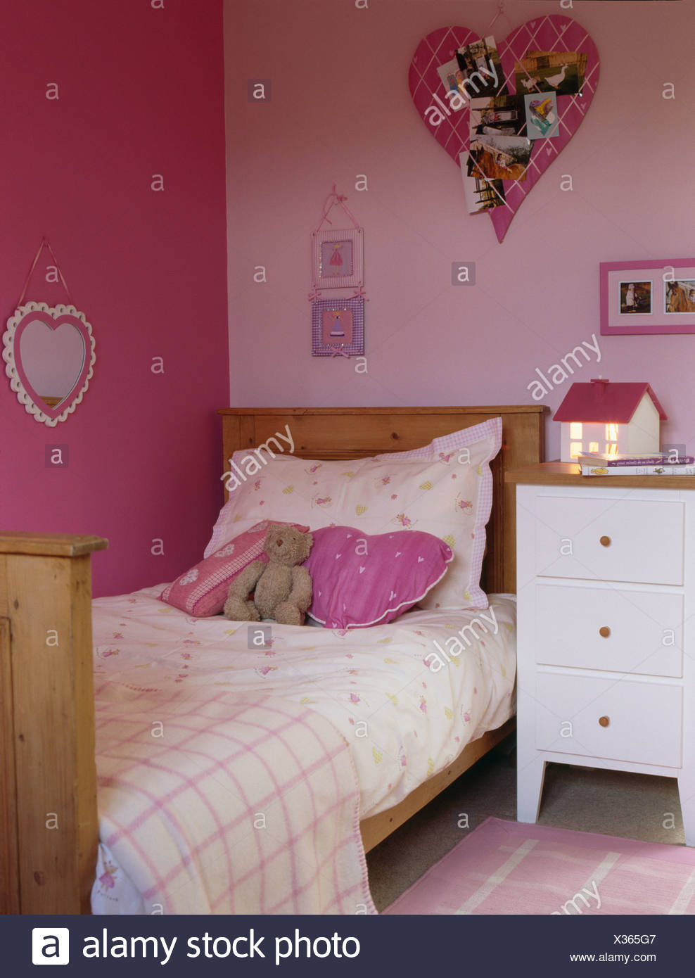 Teenager S Pink Bedroom With Pine Bed And Pink Heart Shaped