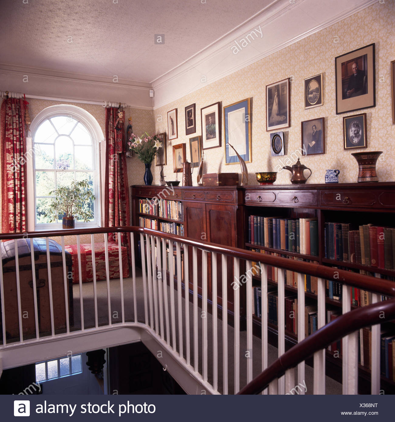 Mahogany Hand Rail And Painted Banisters On Landing Of Georgian