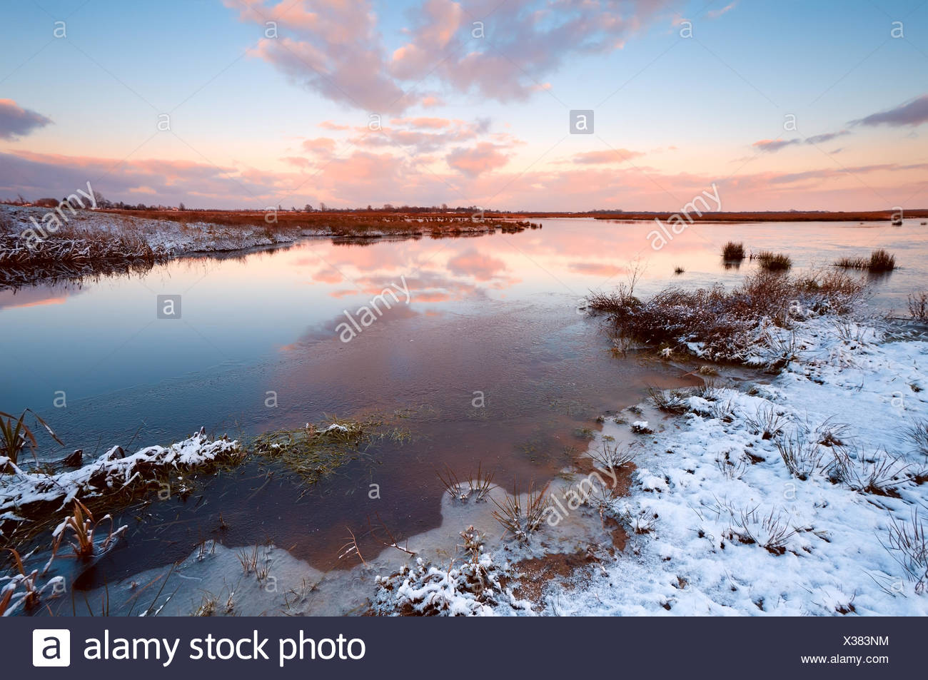 sunrsie over river in winter Stock Photo