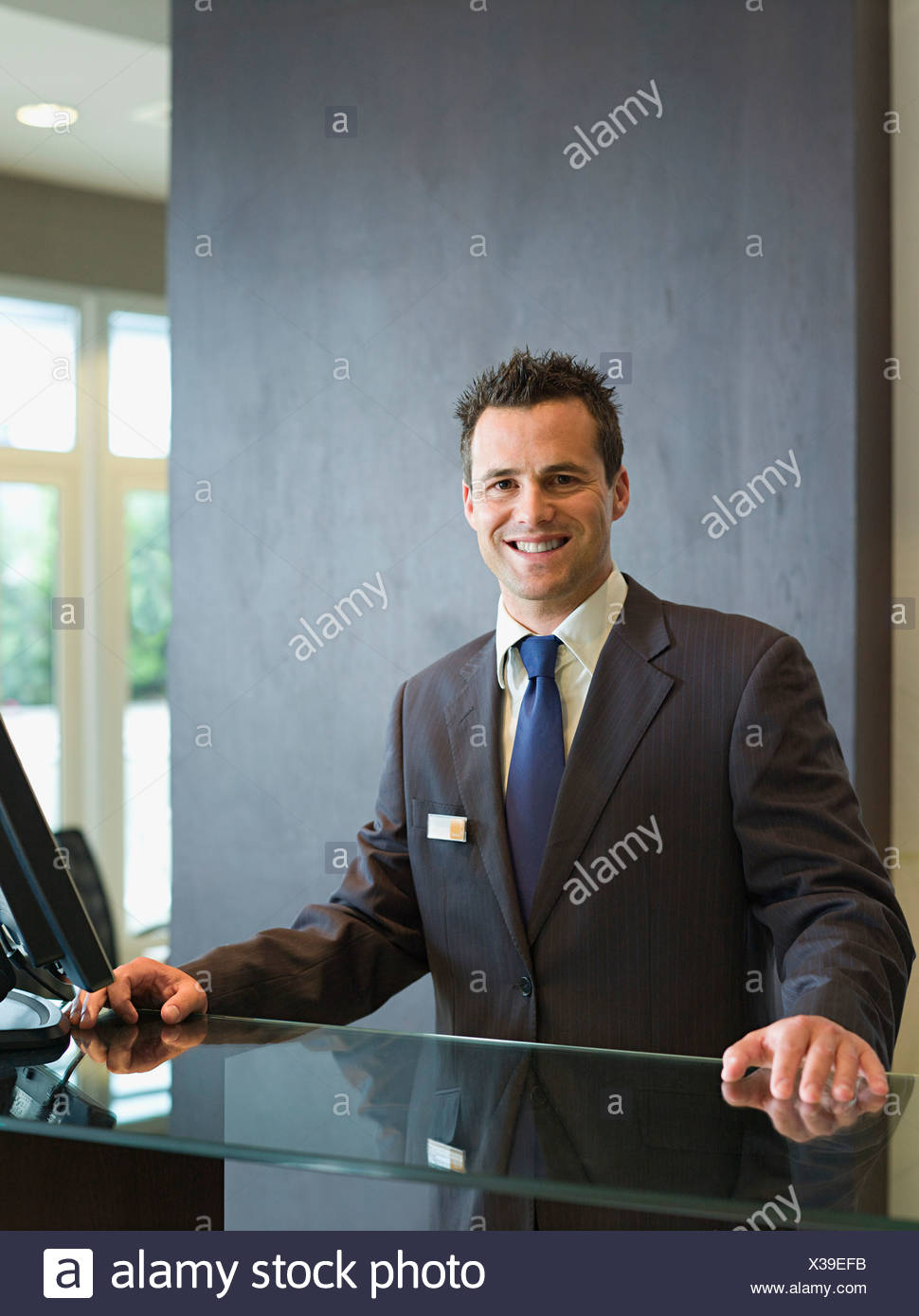 Reception Hotel Man High Resolution Stock Photography And Images Alamy