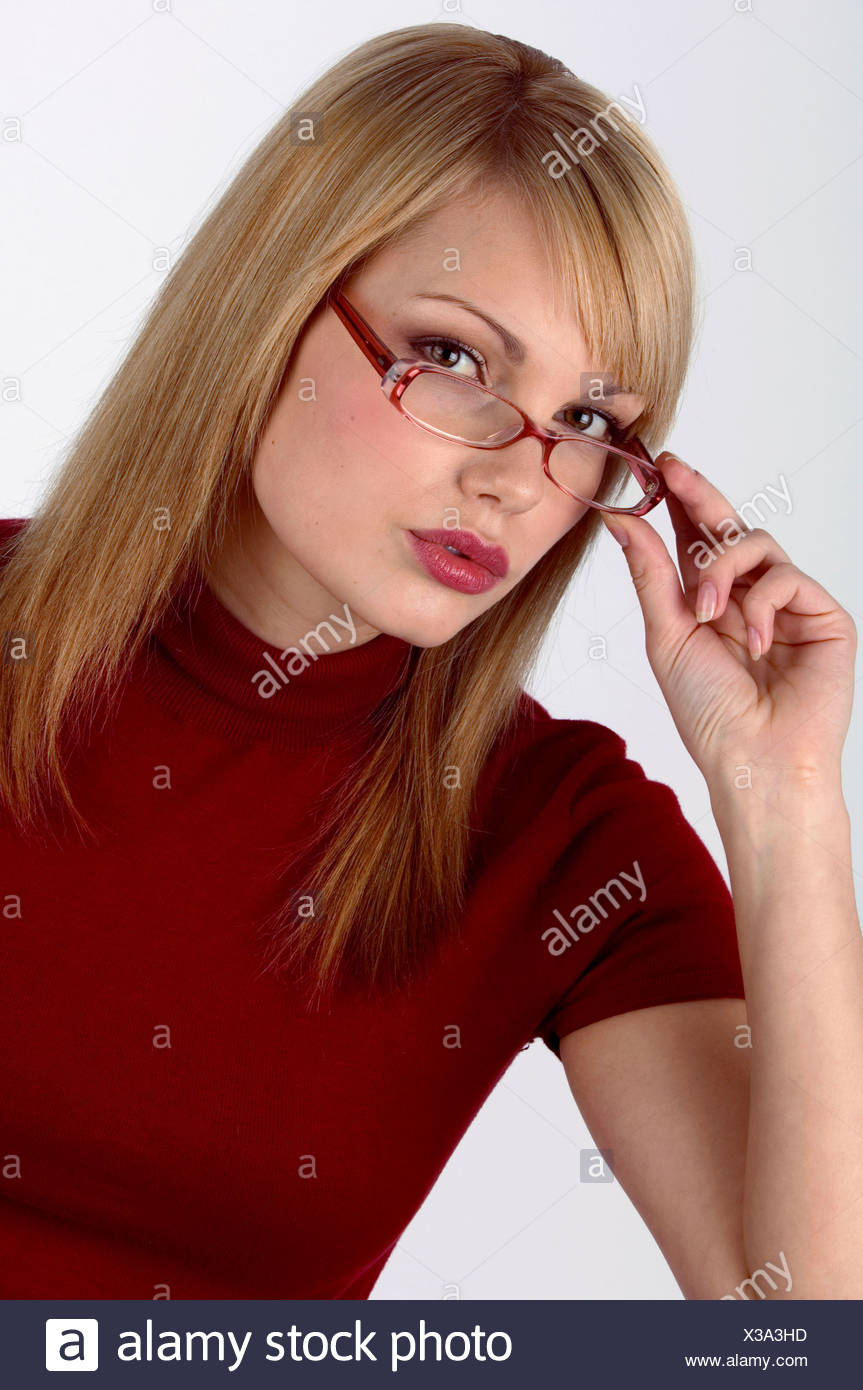 Female Blonde Hair Wearing A Short Sleeved Roll Neck Top Brown