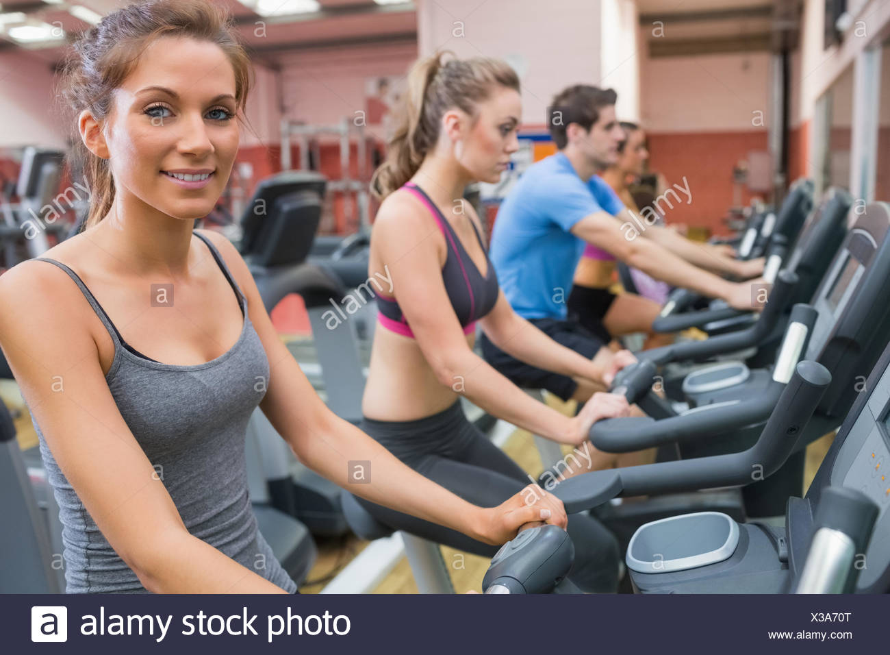 riding the bike at the gym