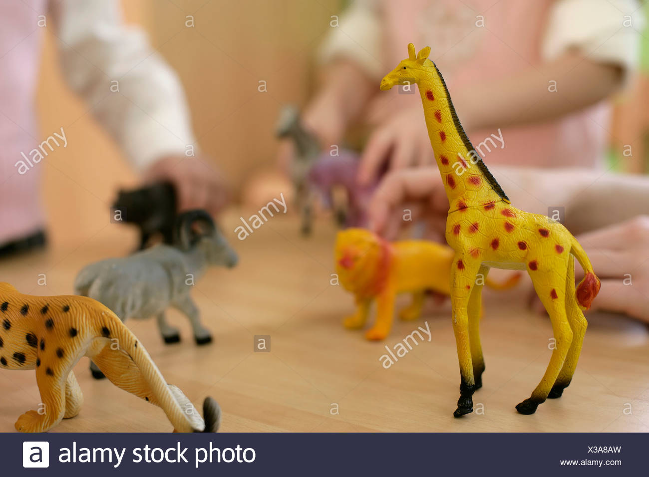 playing with toy animals