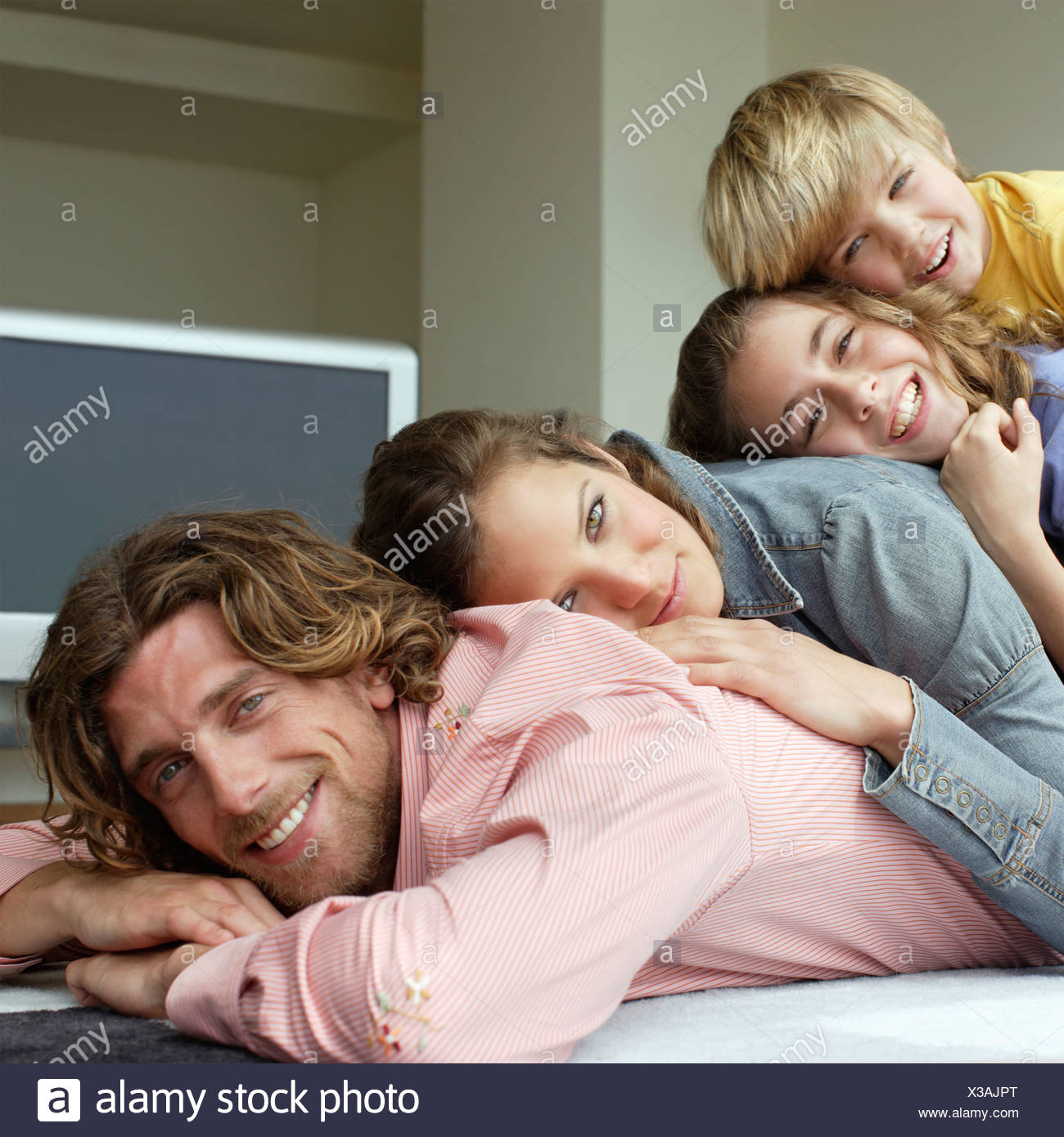 Couple Laying On Top Other Stock Photos & Couple Laying On Top Other