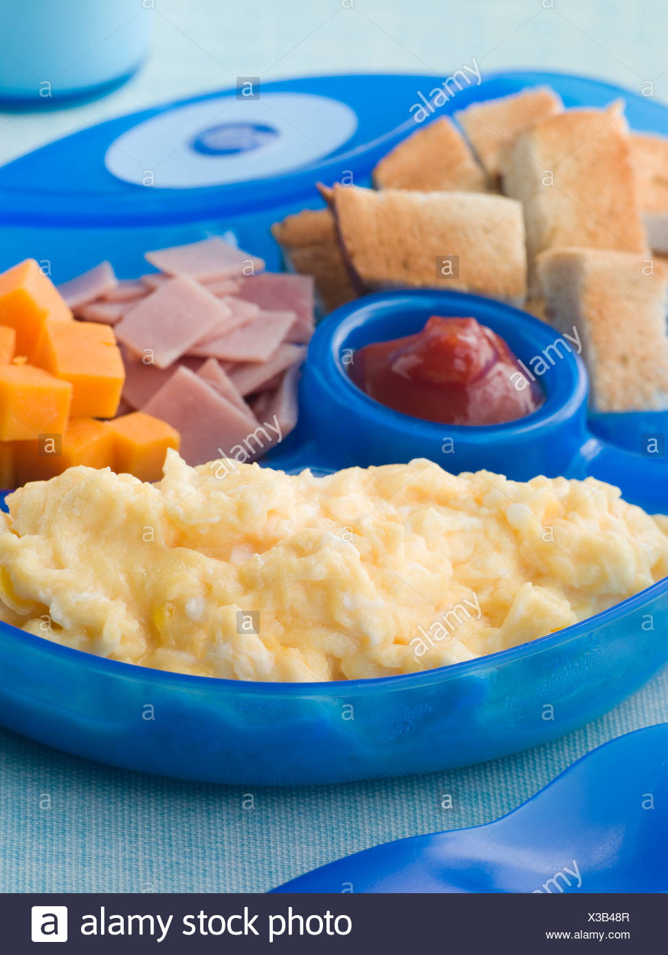 Scrambled Egg With Toast Ham And Cheese Squares Stock Photo Alamy
