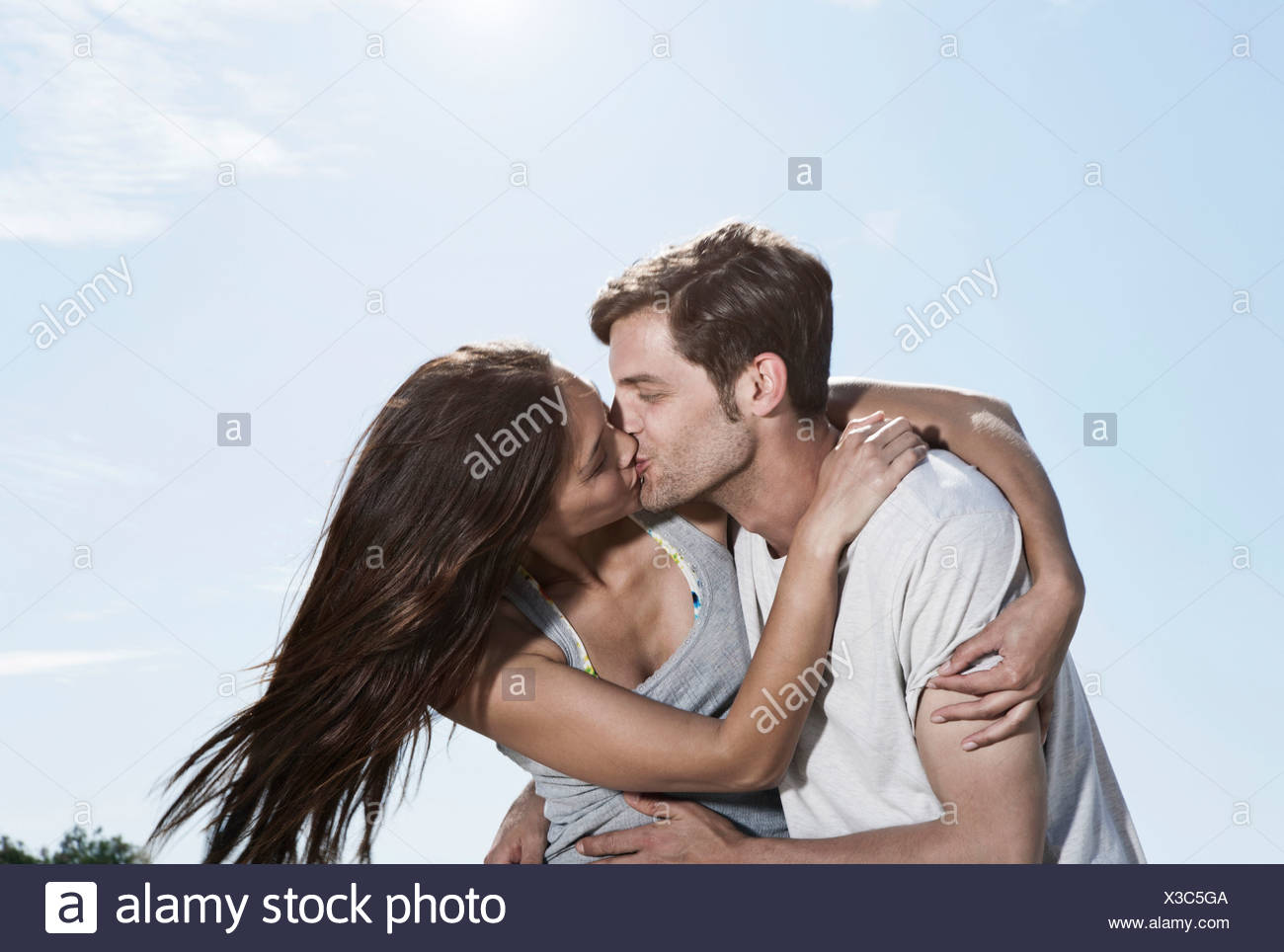 Spain Majorca Young Couple Kissing Each Other Stock Photo Alamy