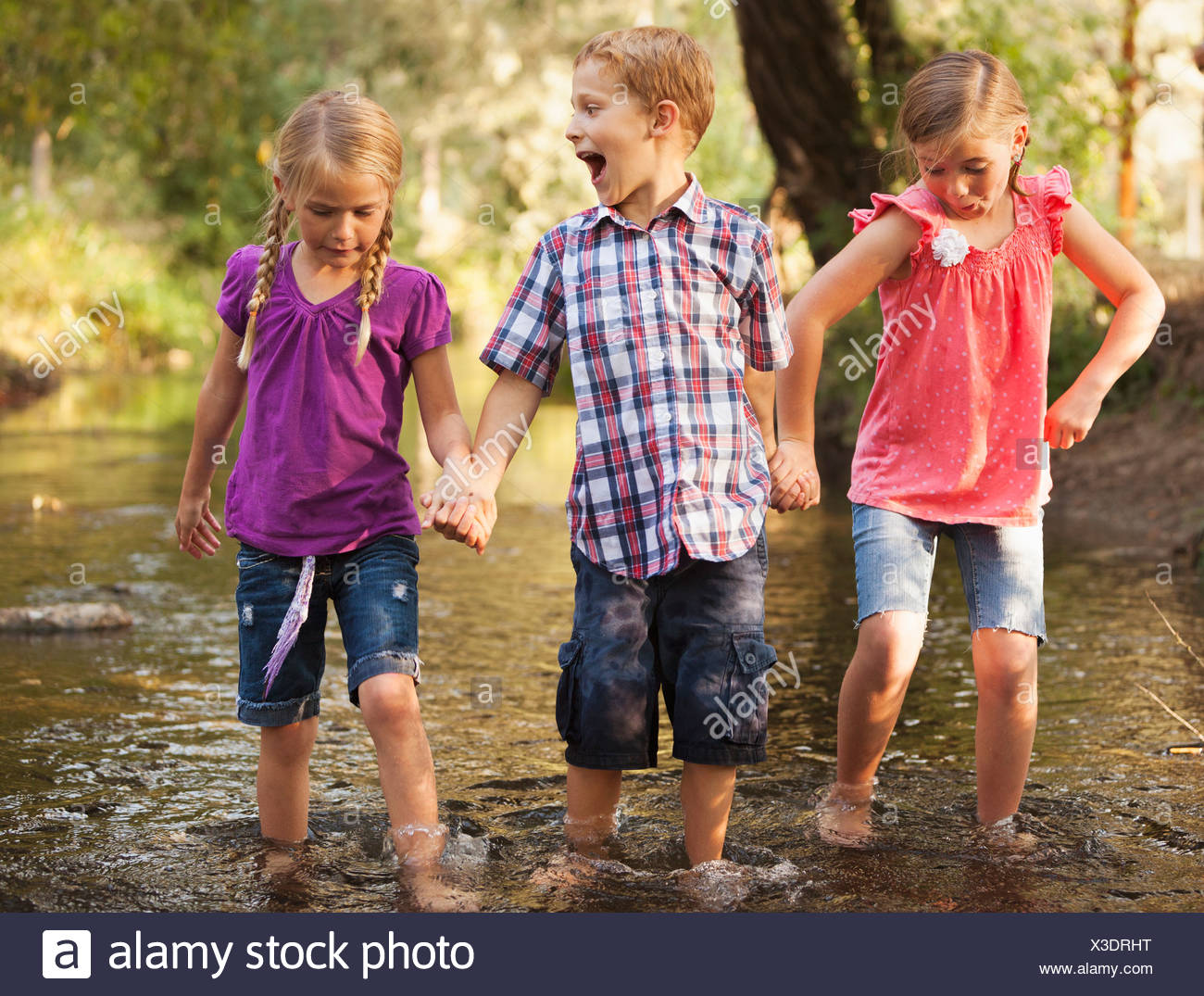 Three Girls Holding Hands High Resolution Stock Photography and Images ...