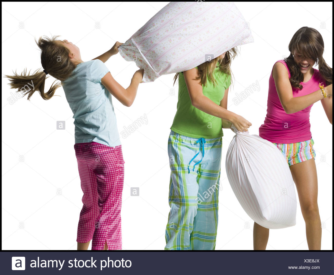 Three Girls Pillow Fighting Stock Photo 277523986 Alamy