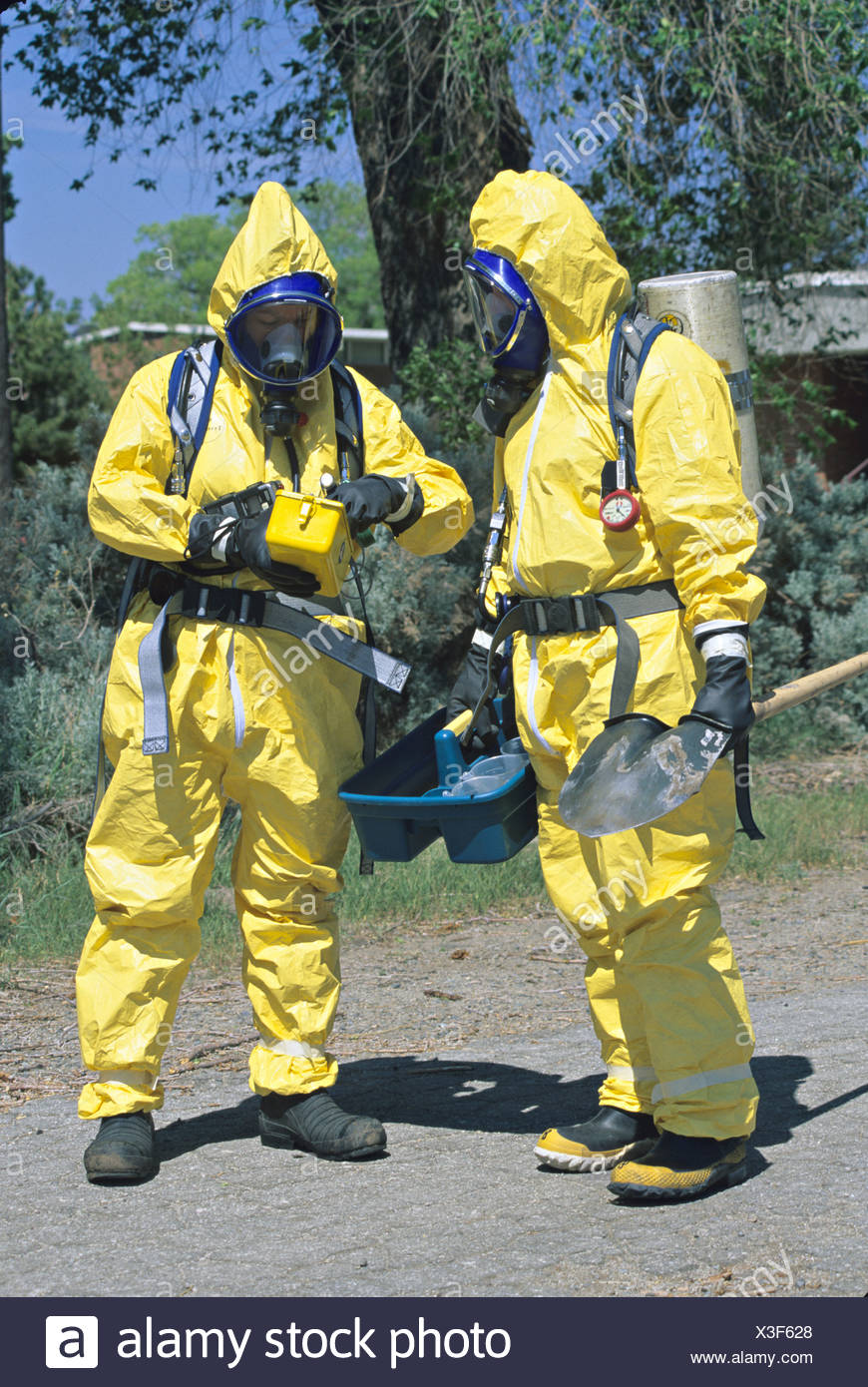 Hazmat Team Prepares To Approach Toxic Substance Spill Stock Photo