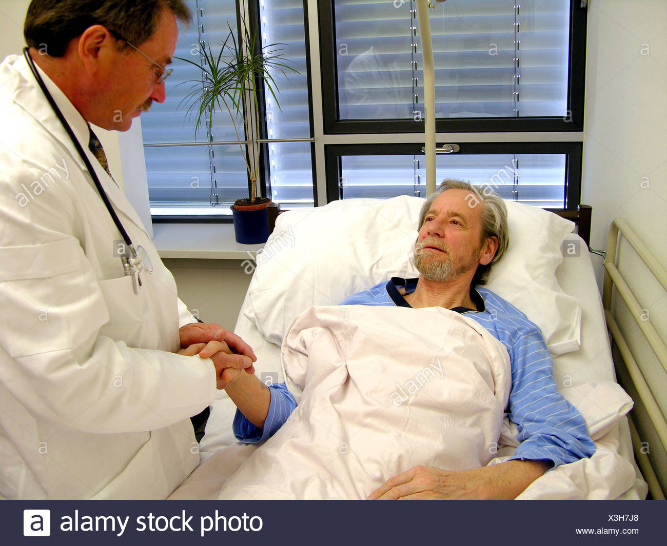 Doctor's visit in the hospital Stock Photo