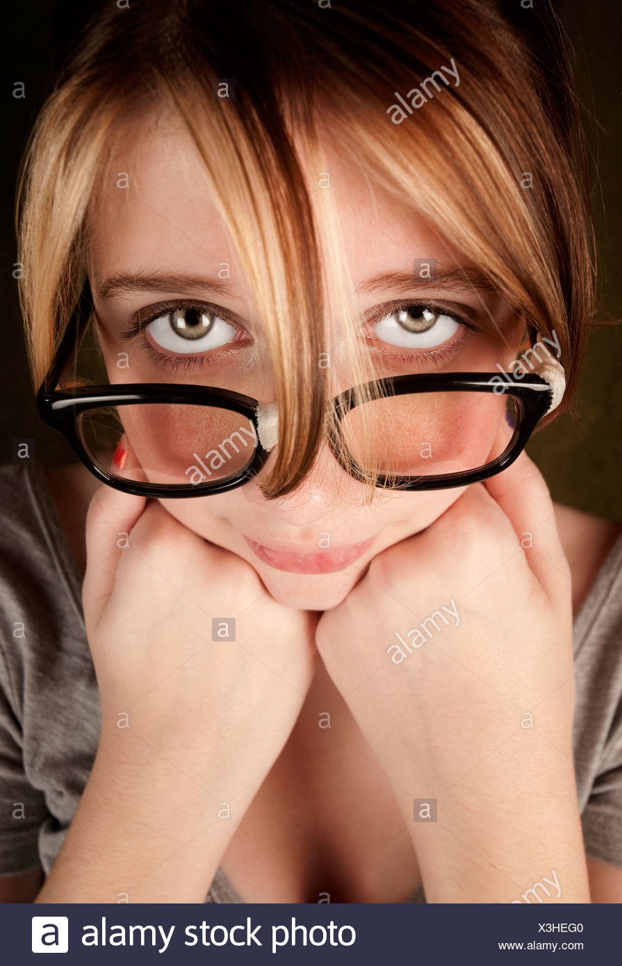 Portrait Of Nerdy Teen Girl With Green Eyes Stock Photo Alamy
