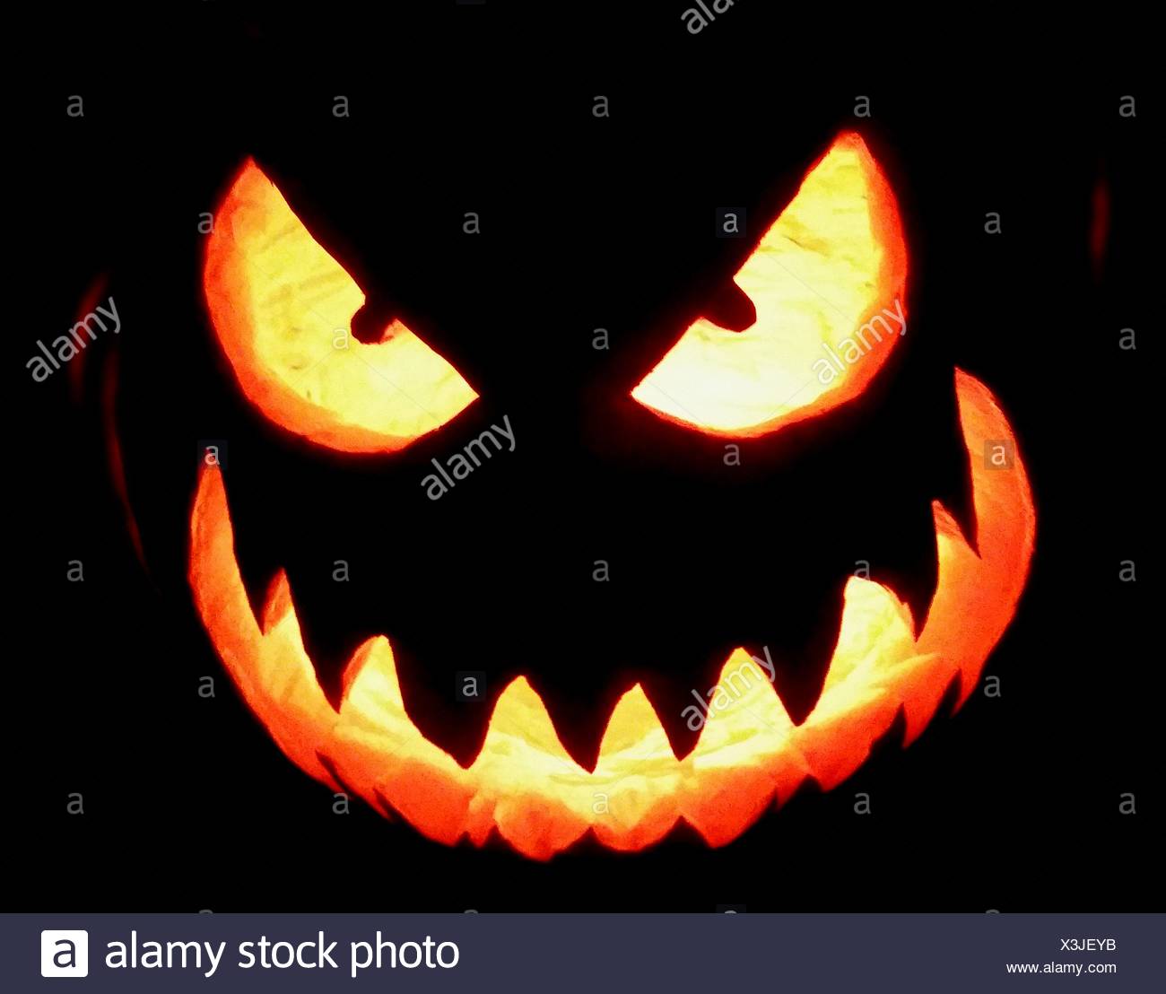 Backlit Pumpkin Face Stock Photo Alamy