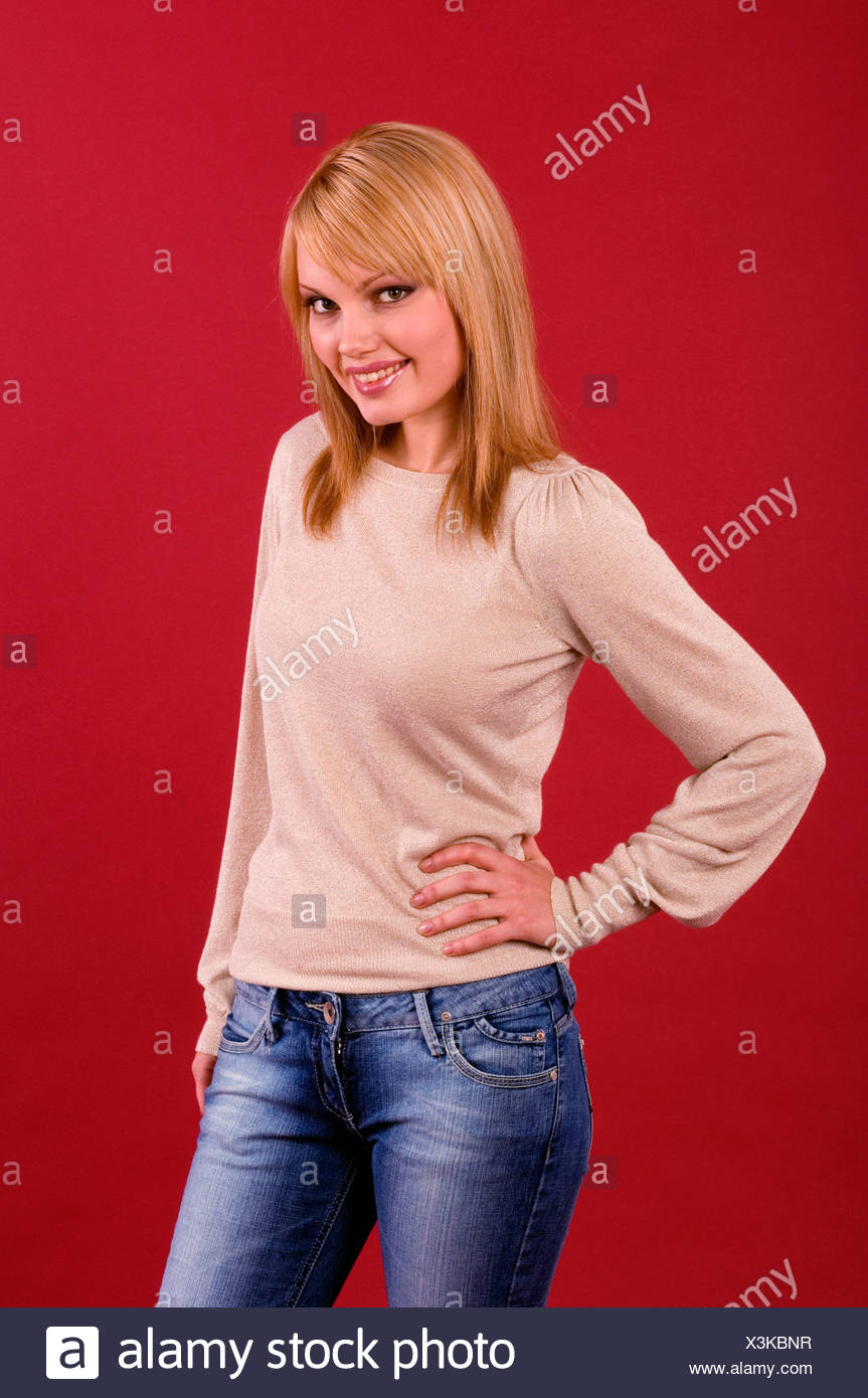 Female With Shoulder Length Dark Blonde Hair Wearing A Long