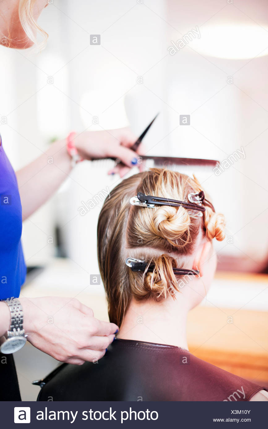 Woman With Hair Clips In Hair In Salon Stock Photo 277649707 Alamy