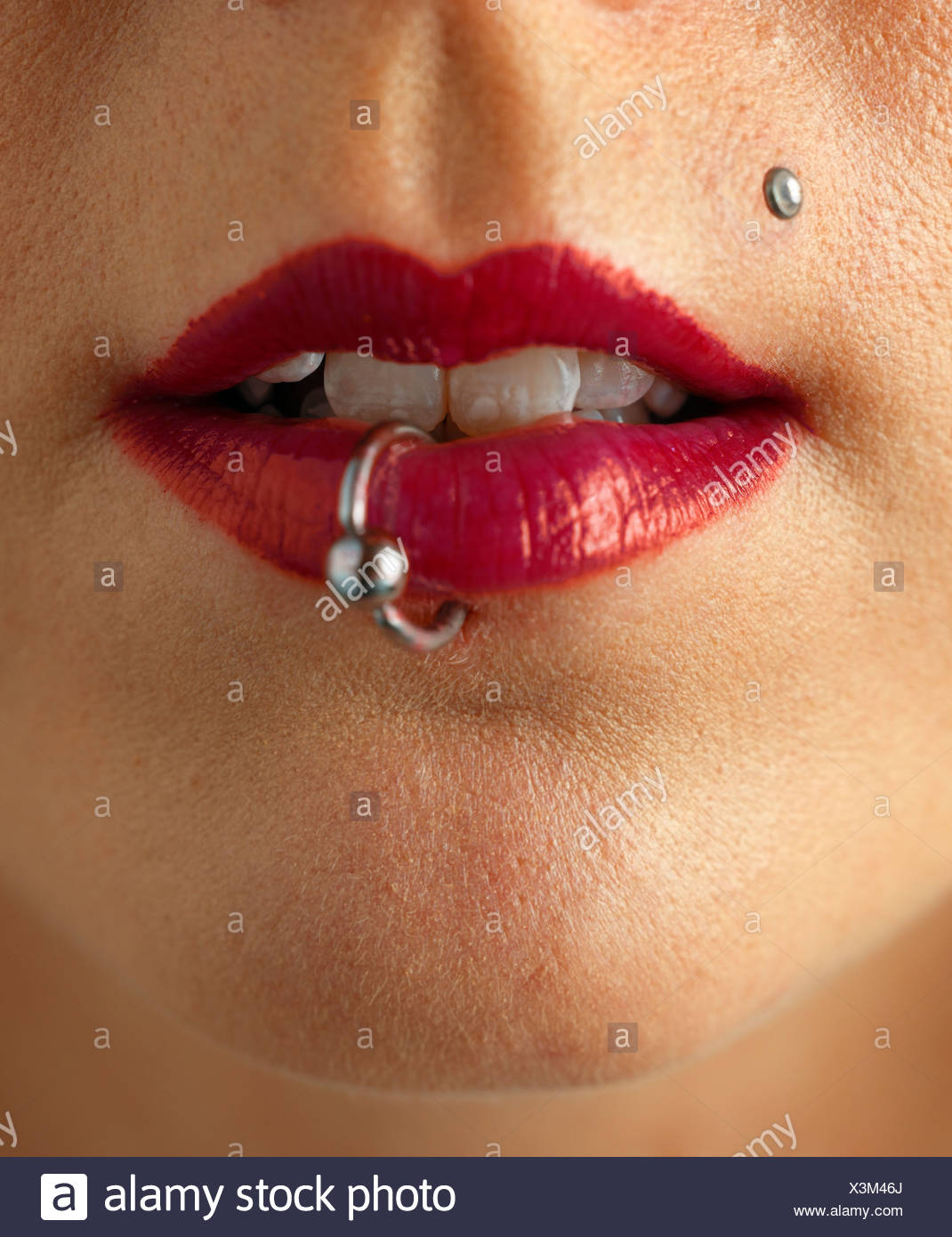 Download Detail Shot Of A Ring In Red Lips Stock Photo Alamy Yellowimages Mockups