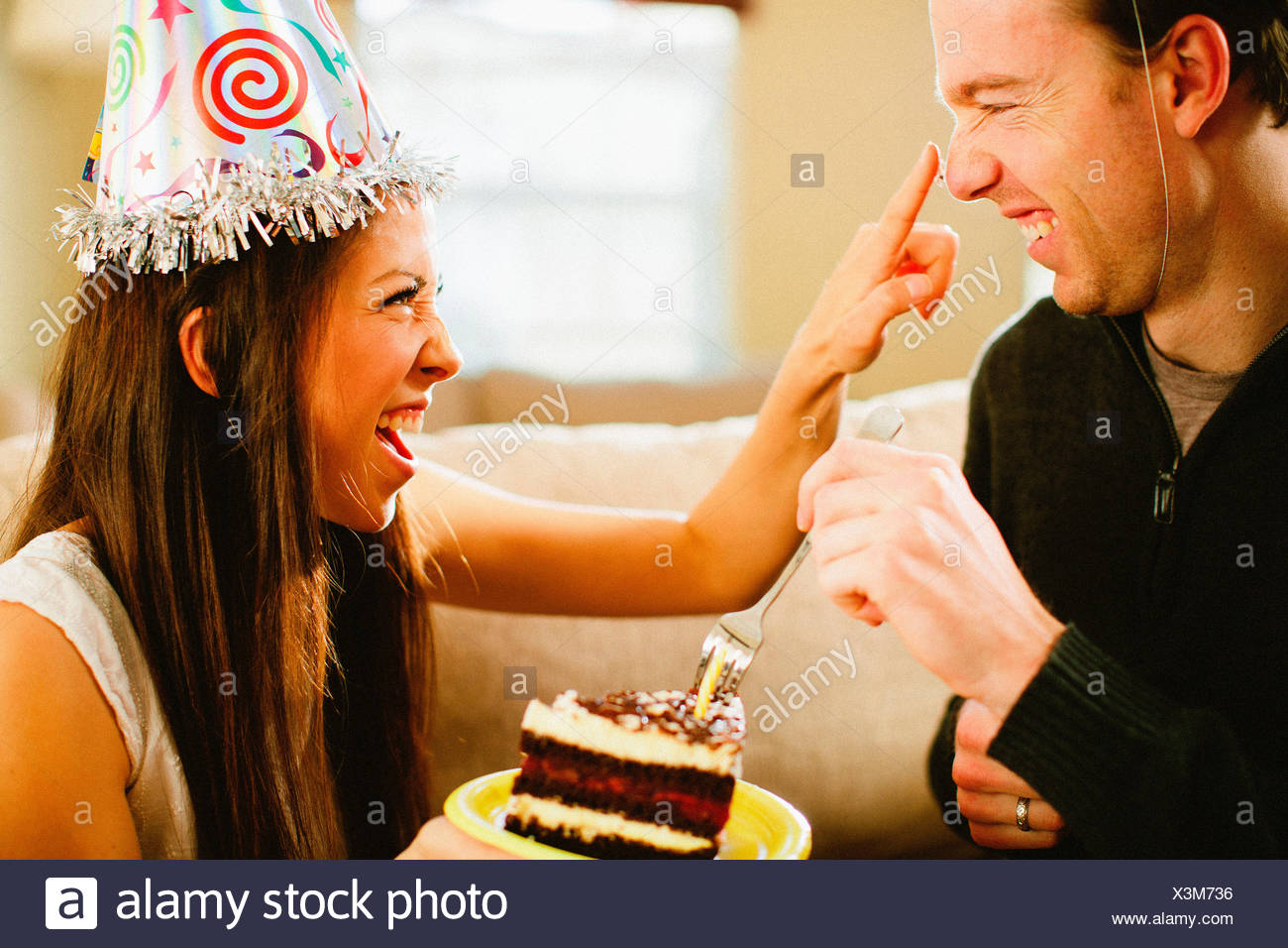 Young Couple Celebrates Birthday With Cake Stock Photo Alamy Young Couple Celebrates Birthday With Cake Stock Photo Alamy