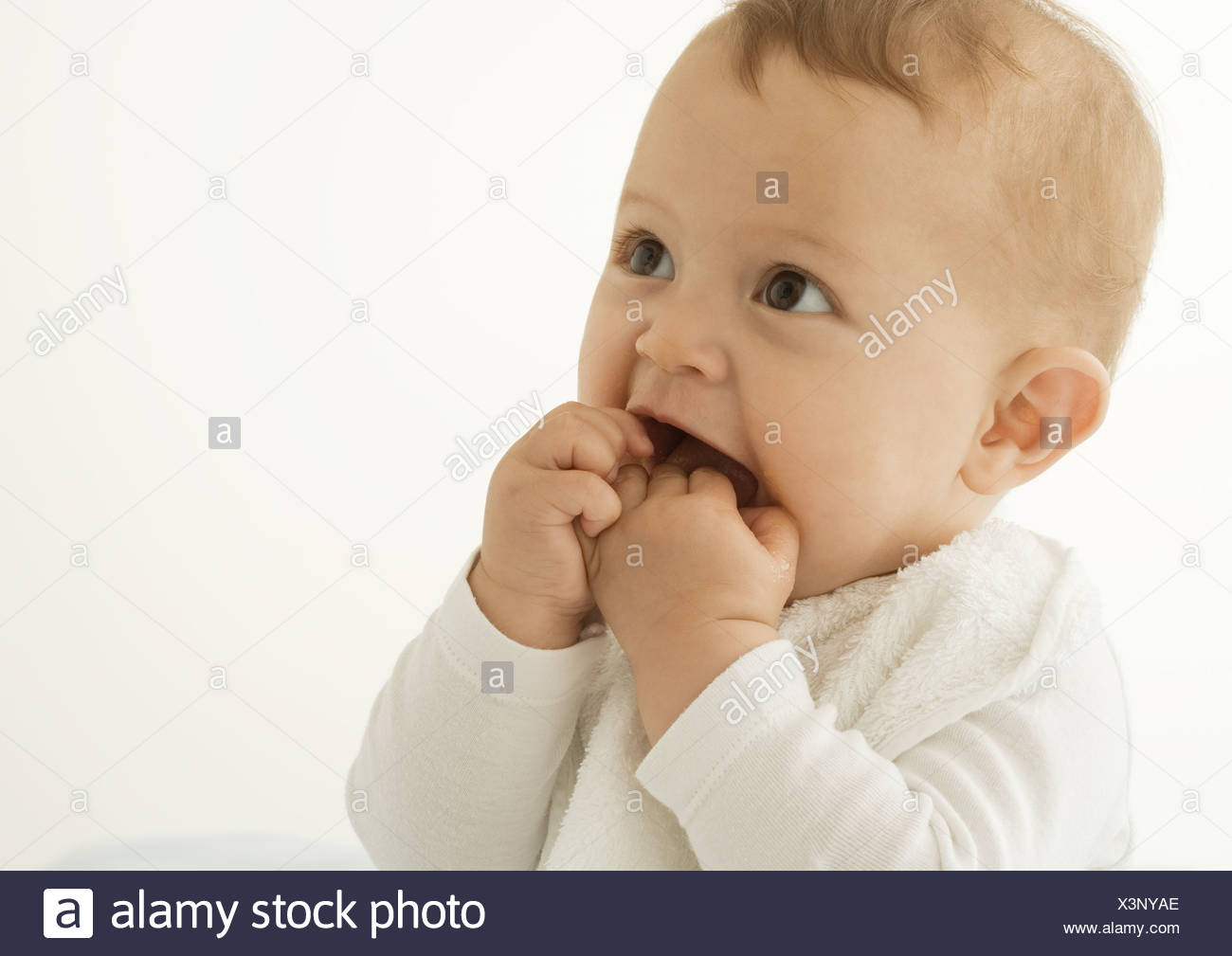 infant hands in mouth