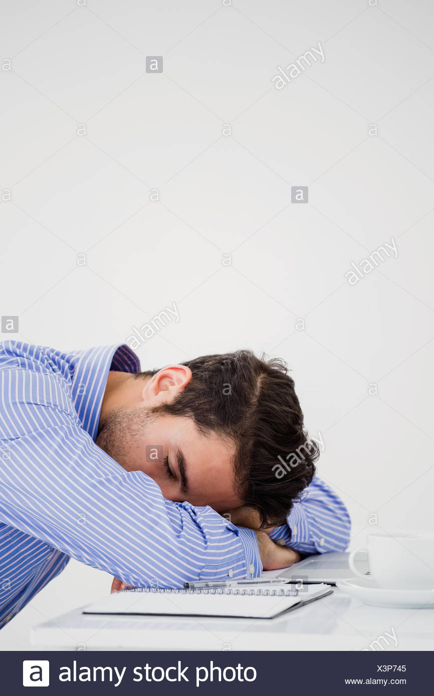Businessman Putting His Head Down On Desk Stock Photo 277698405