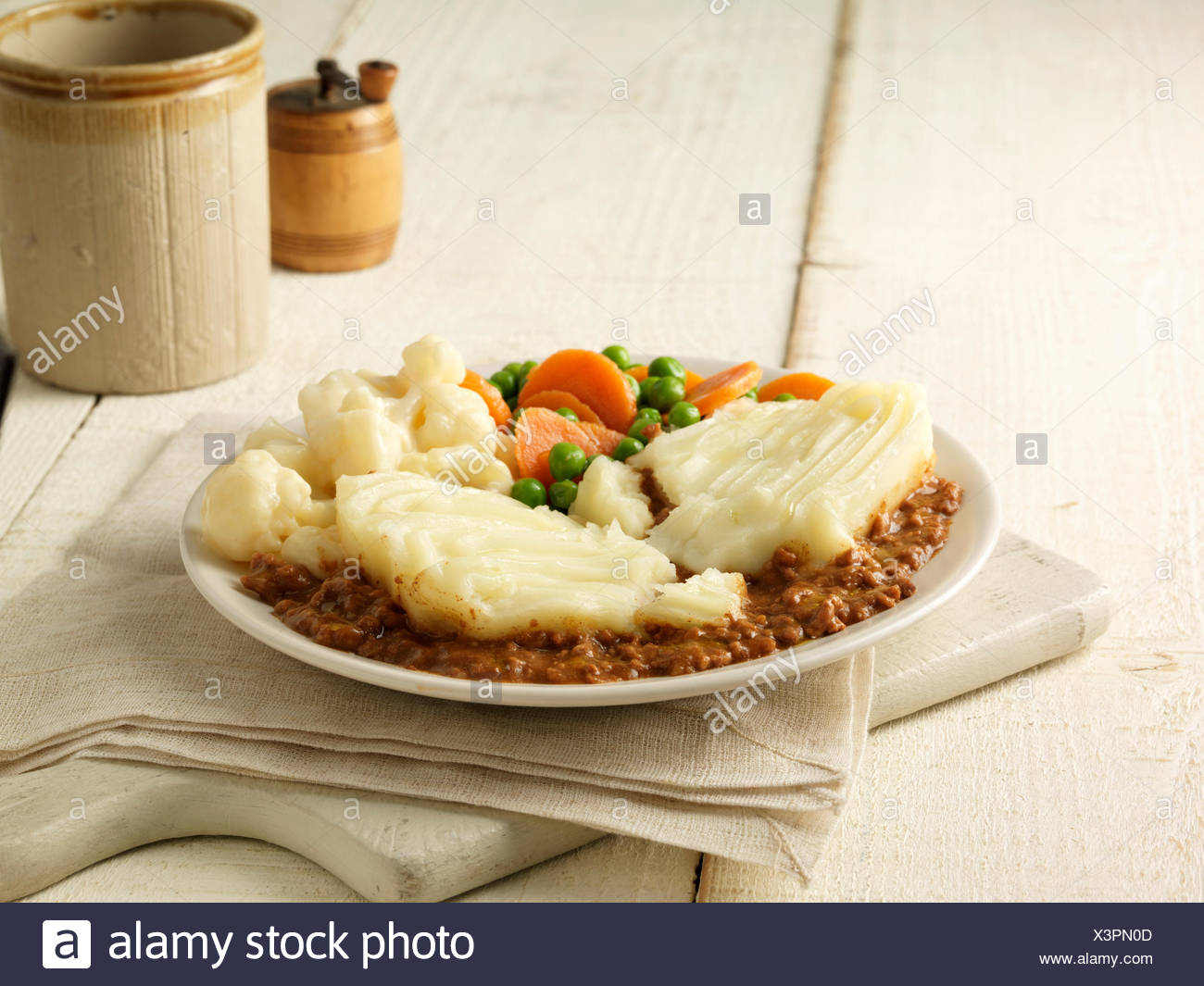 Plate Of Cottage Pie With Cauliflower Cheese Peas And Carrots