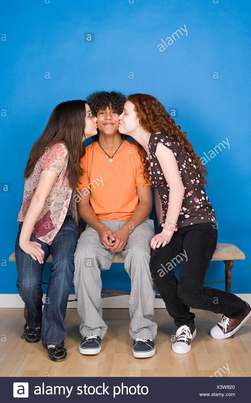 Teenage Girls 16 17 Kissing Teenage Boy 14 15 Stock Photo Alamy