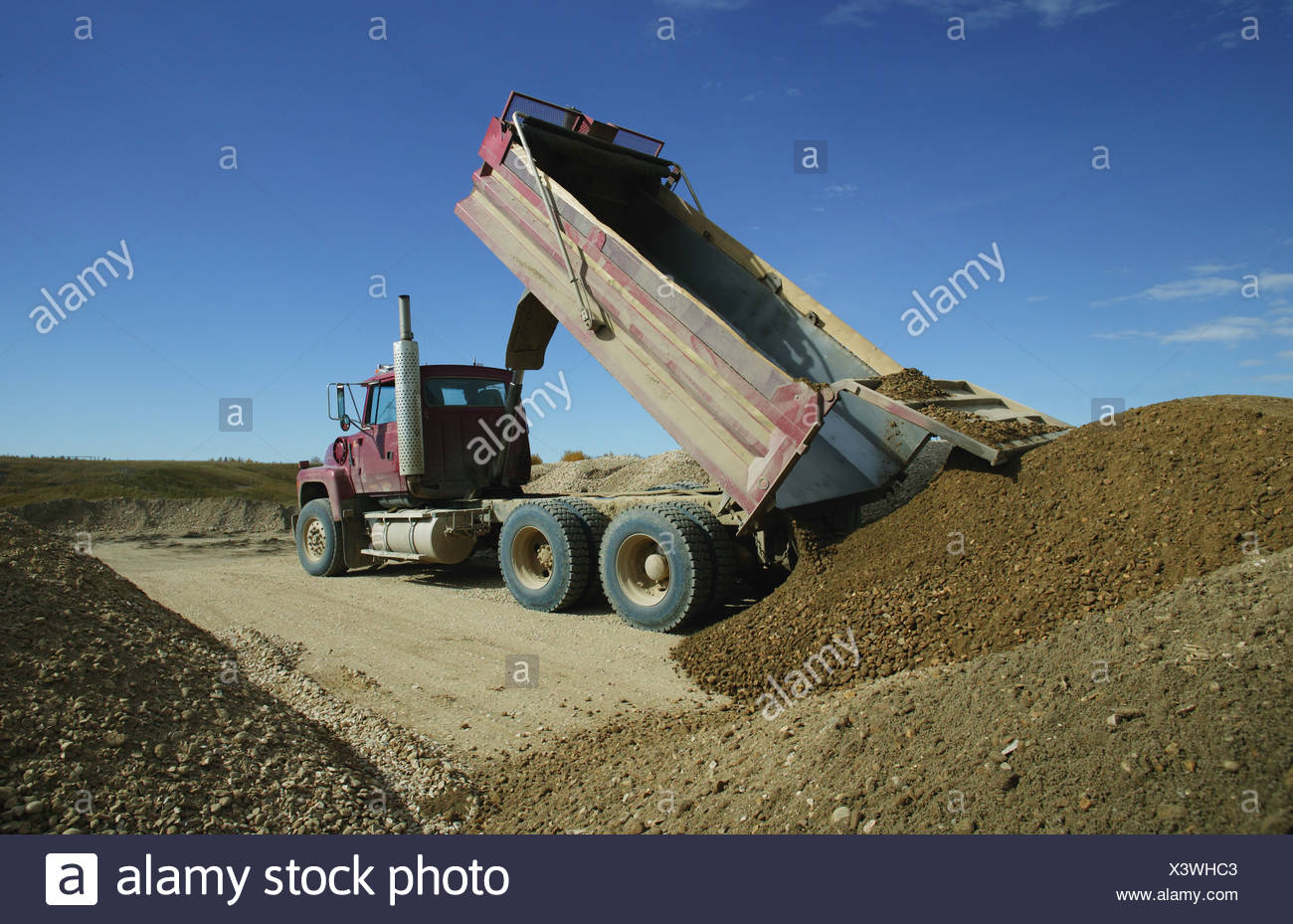 Dump Truck Unloading High Resolution Stock Photography and Images - Alamy