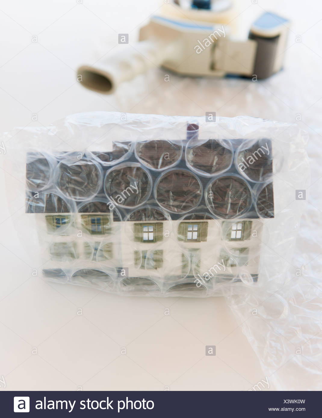 Studio shot of house wrapped in bubble wrap Stock Photo: 277773577 ...