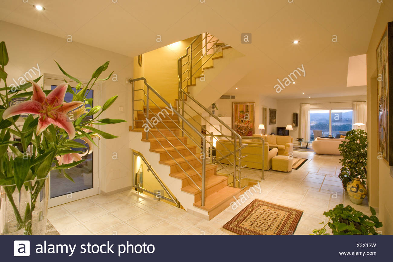 Openplan Living Room And Hall With Staircase To First Floor In